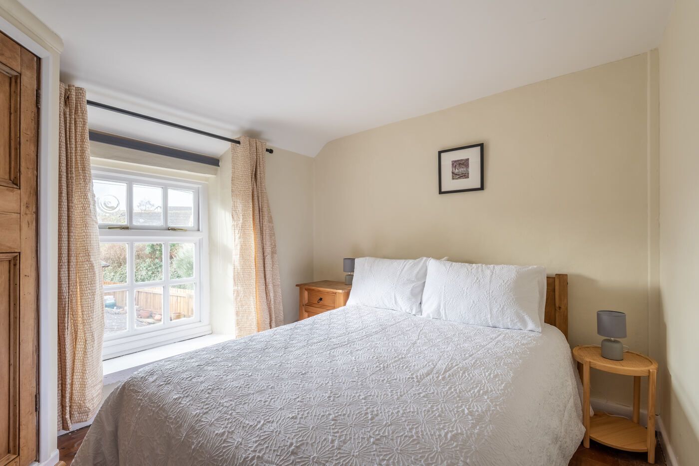 Cosy double bedroom with a sash window